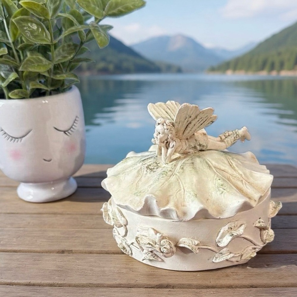 Vintage 1980 Avon Lily Fairy Daydreaming trinket or keepsake box.